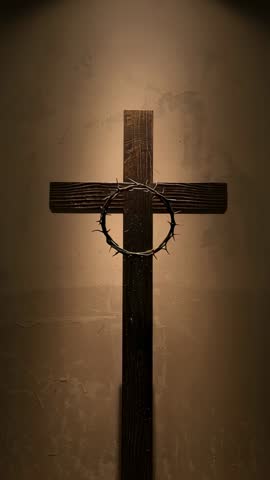 Vertical devotional video featuring wooden cross and crown of thorns in dramatic spotlight