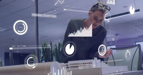 Architect reviewing scale model with holographic data visualization and analytics overlays