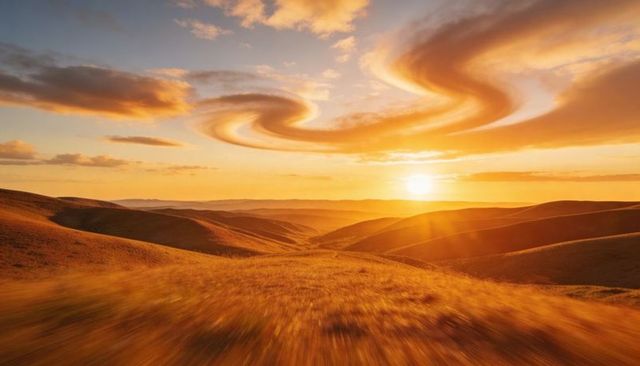 Rolling golden hills glowing at sunset with swirling cloud vortex over grassland