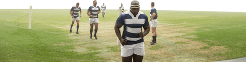 Diverse male rugby players warming up on transparent background