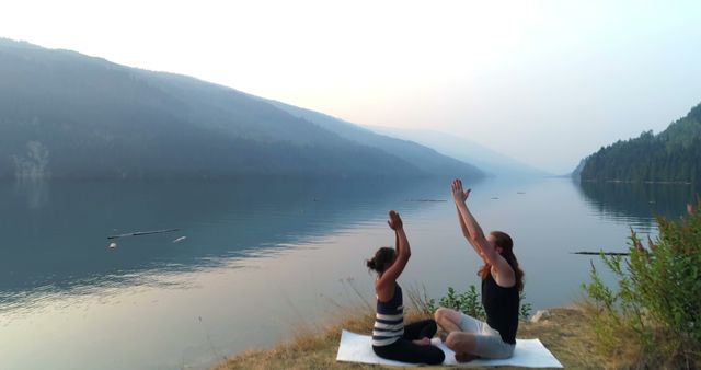 Couple Practicing Yoga by Tranquil Lake at Sunrise - Download Free Stock Images Pikwizard.com