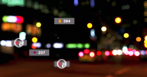 Social Media Icons Overlaying Blurry Urban Night Lights