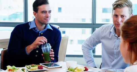 Business lunch meeting emphasizing work-life balance and nutrition