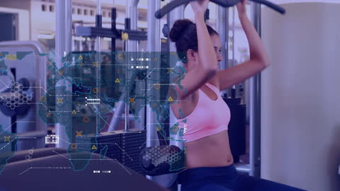 Woman Exercising Uses Data Analysis in Gym Setting