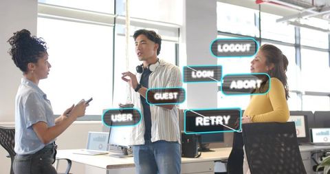 Team discussing user-interface labels with augmented overlays in bright open-plan workspace
