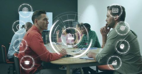 Collaborating colleagues discussing digital strategy with holographic icons and data