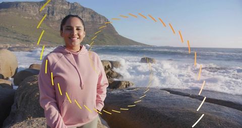 Smiling Woman in Nature with Ocean and Mountain Background