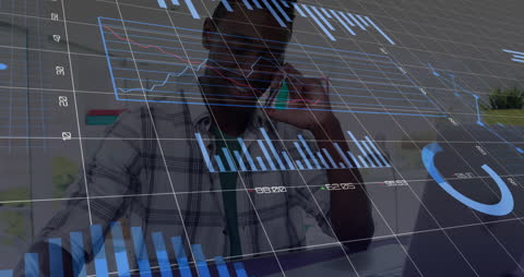 Businessman Analyzing Data with Graph Overlays
