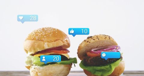 Gourmet burgers attracting social engagement with like, heart and comment badges