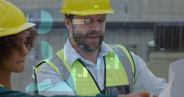 Engineers wearing yellow hard hats and safety vests are analyzing a blueprint with a digital data hologram overlay in an urban construction environment. Suitable for themes related to modern engineering, technology integration in construction, teamwork, and urban development.