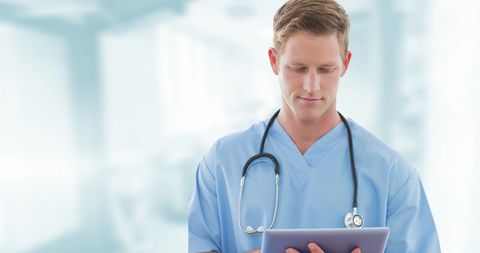 Male Nurse Using Digital Tablet in Hospital - Download Free Stock Images Pikwizard.com