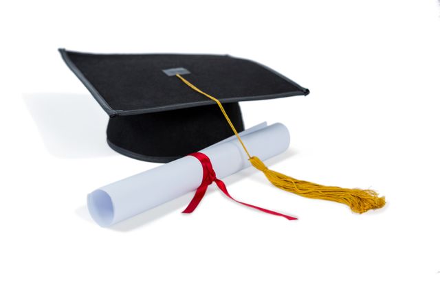 Graduation cap with a yellow tassel and a rolled diploma tied with a red ribbon on a white background. Ideal for use in educational materials, graduation announcements, academic achievements, and celebratory content related to school or university graduations.