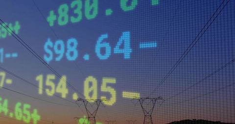 Transmission Towers at Dusk with Digital Energy Price Ticker Overlay Showing Market Prices