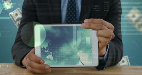 Businessman Displaying Tablet with Global Finance Analytics - Download Free Stock Images Pikwizard.com