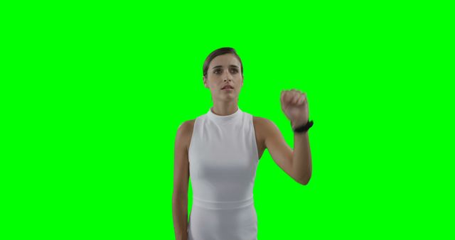 Ideal for use in interactive projects, presentations, and digital media. The green screen allows for easy background replacement to fit various themes, making it versatile for advertisements, demonstrations, and educational materials.