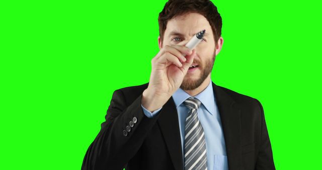 Businessman Holding Marker Isolated on Green Screen Background - Download Free Stock Images Pikwizard.com