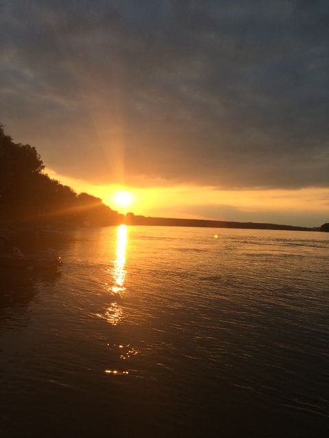 Serene Sunset Over Calm River - Download Free Stock Photos Pikwizard.com