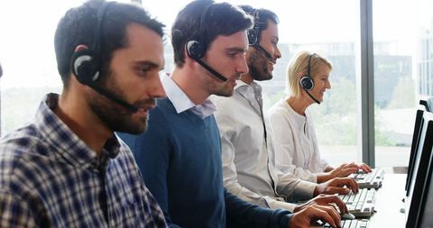 Customer Service Team Working on Headsets in Modern Office - Download Free Stock Images Pikwizard.com