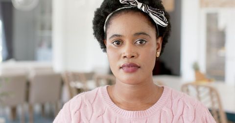 Thoughtful African American Woman in Cozy Home Setting - Download Free Stock Images Pikwizard.com