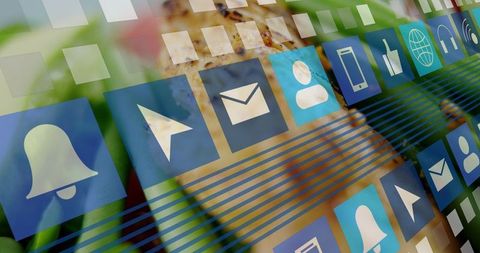 Displaying blue app icon grid overlay on blurred interior for futuristic digital interface
