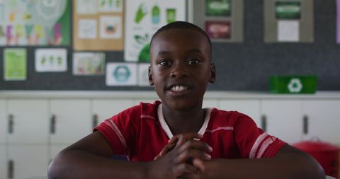 African American Boy Enthusiastically Participating in Classroom Discussion - Download Free Stock Images Pikwizard.com