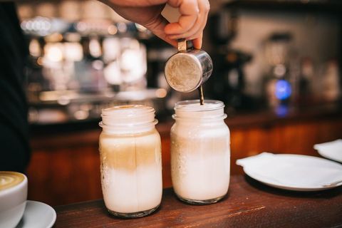 Artisanal coffee brewing in mason jars at cafe