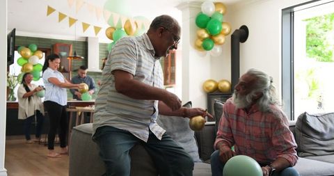 Senior friends preparing for a joyful celebration
