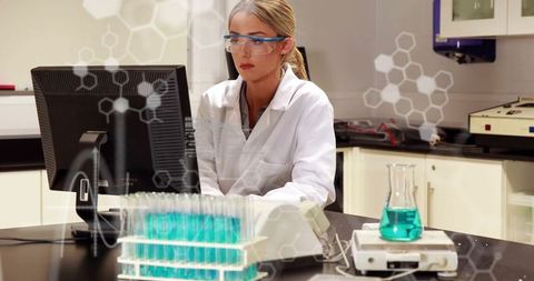 scientist analyzing data with computer in modern laboratory - Download Free Stock Images Pikwizard.com