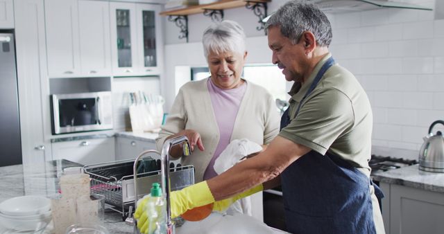 Senior Couple Washing Dishes in Modern Kitchen - Download Free Stock Images Pikwizard.com