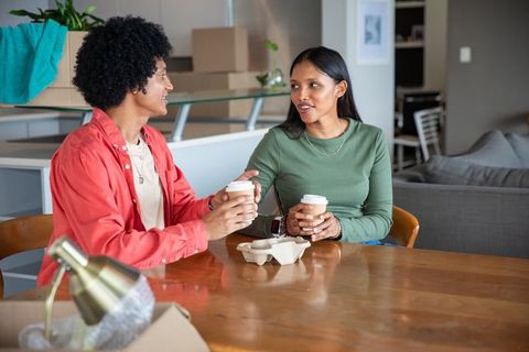 Couple Enjoying Coffee Break During Urban Move
