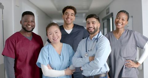 Diverse Healthcare Team Standing Together in Hospital Corridor - Download Free Stock Images Pikwizard.com