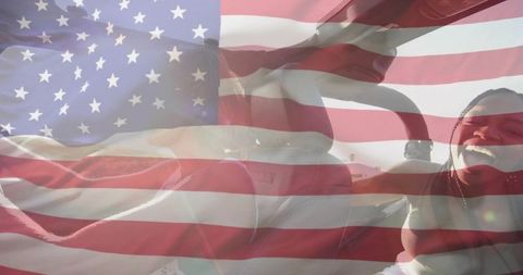 Laughing friends driving convertible with american flag double exposure road trip freedom