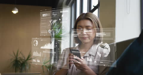 Businesswoman Analyzing Data on Smartphone in Office Environment