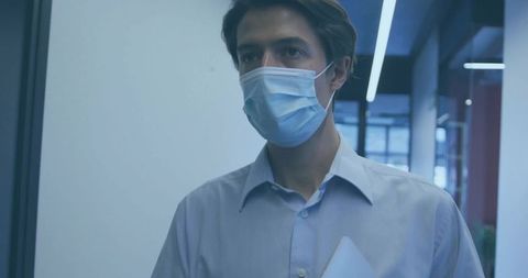 Business Professional Wearing Mask in Office Environment