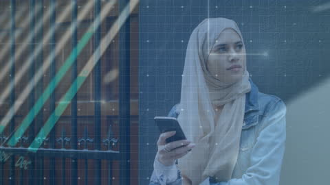 Muslim Woman Engaging with Smartphone Amid Digital Data Visualization