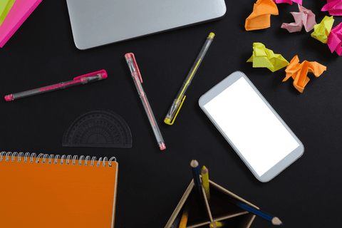 Transparent Desk with Laptop, Smartphone, and Colorful Stationery - Download Free Stock Videos Pikwizard.com