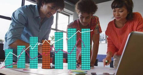 Young Team Analyzing Business Data with Bar and Line Graph Overlay in Modern Office