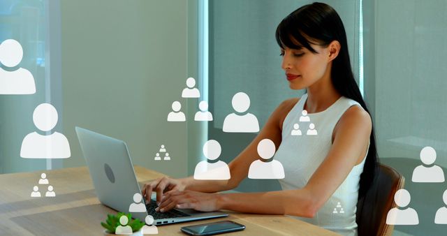 Image of white profile icons, beautiful caucasian woman working on laptop and checking cellphone. Digital composite, multiple exposure, office, networking, abstract and technology concept.