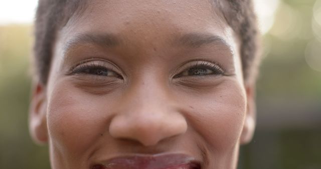 Close-Up of Smiling African American Woman with Short Hair - Download Free Stock Images Pikwizard.com