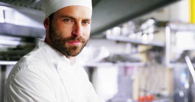 Confident Male Chef in Professional Kitchen with Arm Crossed - Download Free Stock Images Pikwizard.com