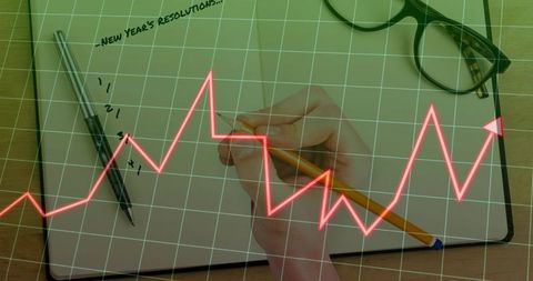 Handwriting new year's resolutions with growth chart overlay