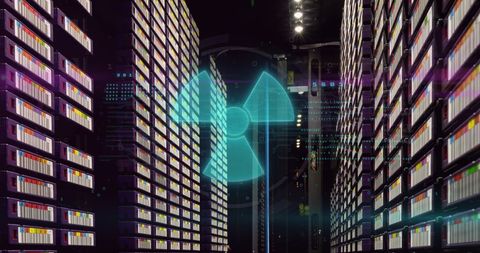 Nuclear symbol over high-tech data processing server room
