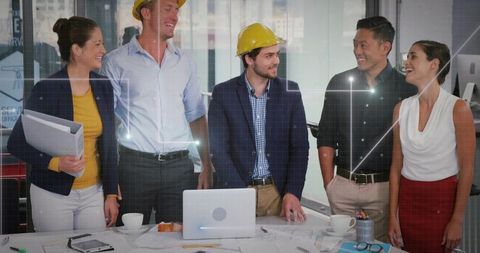 Diverse Professionals Collaborating on Architectural Plans