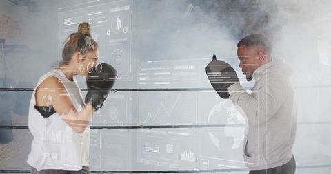 Boxer training with coach using augmented reality hud analytics in boxing ring
