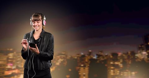 Woman Listening to Music on Smartphone with City Background