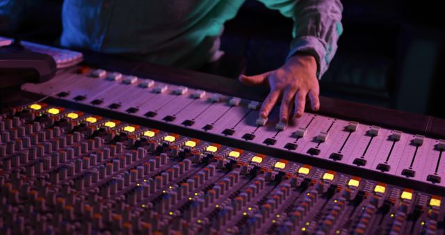 Sound Engineer Mixing Audio on Professional Soundboard in Studio - Download Free Stock Images Pikwizard.com