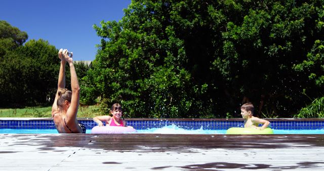 Family Enjoying Summer Vacation in Swimming Pool - Download Free Stock Images Pikwizard.com