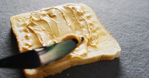 Creamy Peanut Butter Spread on Slice of Toast - Download Free Stock Images Pikwizard.com