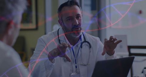 Physician consulting elderly patient with dna helix overlay on laptop in clinic