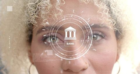 Curly-haired woman facing glowing digital banking interface with futuristic hud overlay